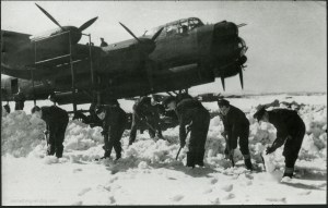 Clearing snow at Waddington, probably February 1944. The original caption identifies Fred Smith as the centre one of the five men with shovels. From the Waddington Collection, RAF Waddington Heritage Centre
