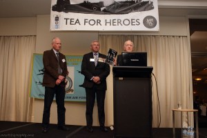 Ron Houghton launching a new book, called Severed Wings about a Bomber Command crew who were shot down and bailed out over Germany. Four members of the crew were subsequently murdered by German civilians. Looking on is the RSL's Ken Doolan and Peter Rees 