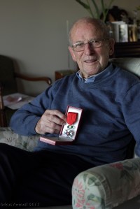 Don McDonald was my interview subject #4 for the International Bomber Command Centre's Digital Archive, and the first of those I've interviewed so far who I already knew beforehand. In fact we are quite good friends, and Don and his wife Ailsa have entertained my partner Rachel and I for dinner on a number of occasions. We spent the afternoon visiting them today only this time I had the laptop and microphones handy... And boy oh boy can he talk! The interview recording goes for more than two hours, by far the longest of those I've collected so far. And there is never a dull moment in it.  Don's war followed much of the "standard" path for Australians in Bomber Command: he was in the Militia when war was declared, transferring to the Royal Australian Air Force a few months later. He completed his pilot training in Australia before going to the UK via the USA. He went through a further succession of training units before being posted to 578 Squadron on Halifaxes at RAF Burn, North Yorkshire, from which he completed his first tour of operations. After a stint as an instructor pilot at an Operational Training Unit he went to 466 Squadron, where he'd done one trip when the war in Europe ended. Don told me of some amazing experiences: crashing a Tiger Moth on his second solo, a close call in a Whitley, and seeing the invasion fleet below on the morning of D-Day. And then there was the lighter side of life: absconding from a transit camp in the USA to visit New York, serving Christmas lunch at RAF Moreton-in-Marsh in 1944 and a particularly memorable leave in London where he met the Queen at a theatre show, queue-jumped a group of American GIs at a hotel and ending up with the crystal glass he's holding in this photo, purloined from the famous Strand Palace hotel. Don finished the war with a Distinguished Flying Cross (he still has the invitation letter from the Investiture ceremony at Buckingham Palace) and earlier this year was awarded a French Legion of Honour. He's als